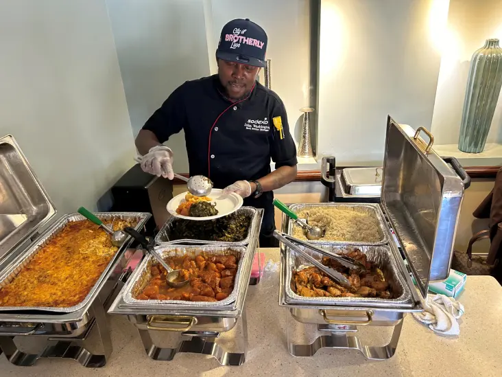 John serves lunch as part of his service to others during Ramadan